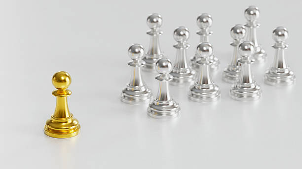 istock Golden Chess Pawn Apart from Silver Pawns Symbolizing Independence & Courage in Distinct Leadership 2246619577