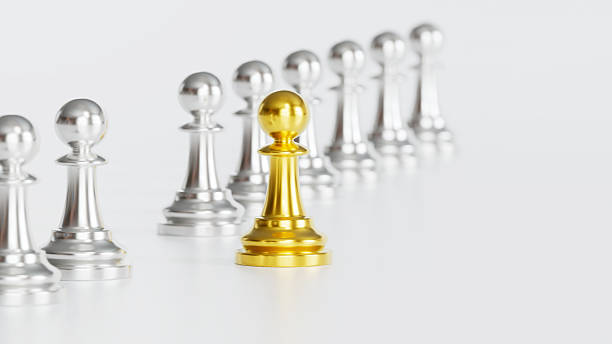 istock Golden Chess Pawn Apart from Silver Pawns Symbolizing Independence & Courage in Distinct Leadership 2246619603