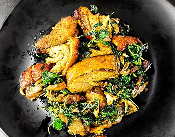 istock Stir-fried roasted duck with basil in plate 2246620171