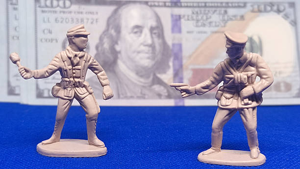 istock Guarding USD immediately conveys the protective theme and highlights the currency. 2246622596