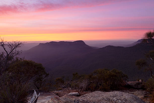 istock Dawn sunrise over dark mountains 2246630030