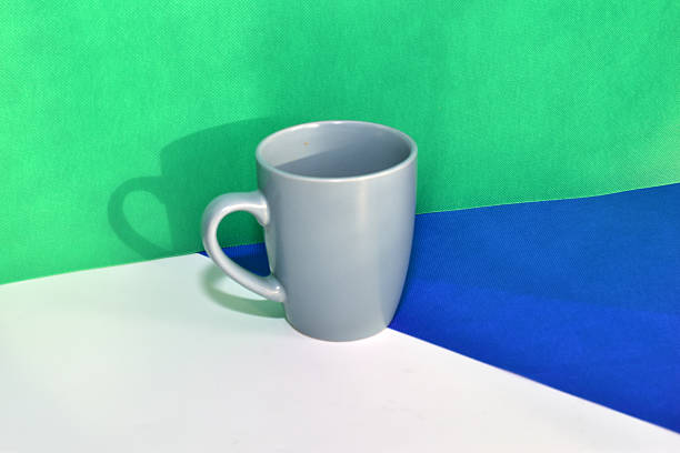 Gray ceramic goblet on a three-tone background.