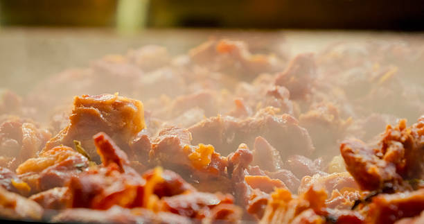 istock Pork meat cooking in a large pan 2246643891