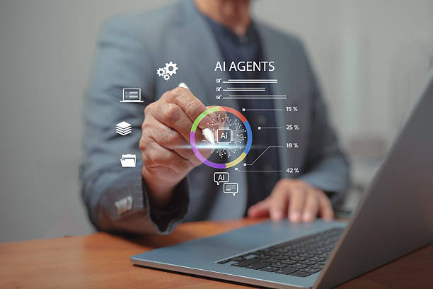 istock A business professional using AI agents on a laptop, showcasing automation, data analysis, and digital transformation for smarter workflow optimization and advanced tech innovation in modern workplaces. 2246645468