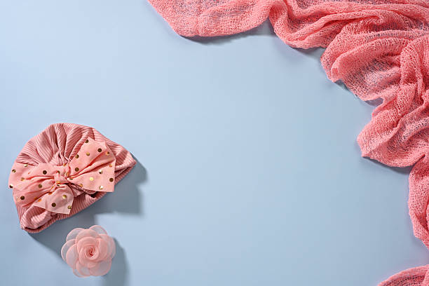 istock Newborn hat and blanket on blue background 2246649160