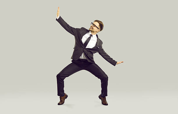 istock Happy businessman or office worker dancing and having fun because weekend is coming soon 2246650698