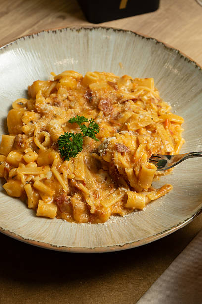 istock Pasta and potato dish on a plate at the restaurant 2246650789