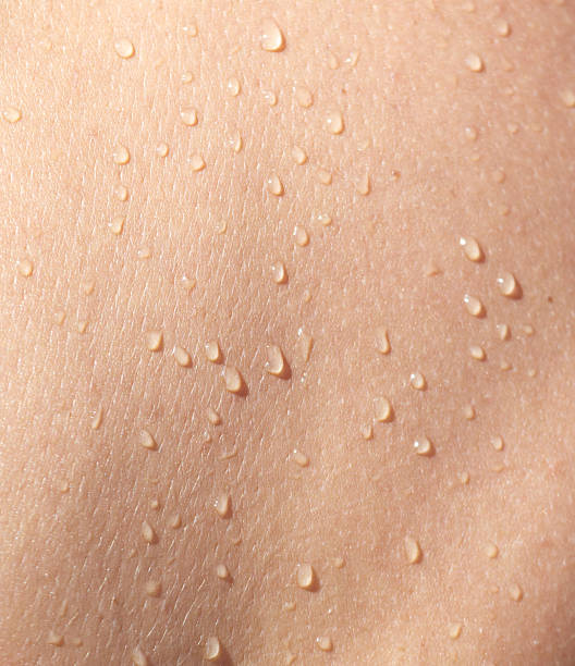 istock A person's back is wet with water 2246654272