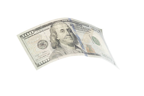 istock One hundred dollar bill floating against a white background, showcasing its detailed design 2246656936