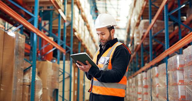 istock Man, logistics or inspection with tablet in warehouse for inventory checklist or storage control. Male person, supplier or checking cargo with technology for distribution or supply chain in depot 2246657455