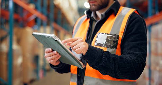 istock Man, hands and inventory with tablet for storage checklist, maintenance or stock control in depot. Male person, supplier or distributor with technology for logistics, distribution or supply chain 2246657460