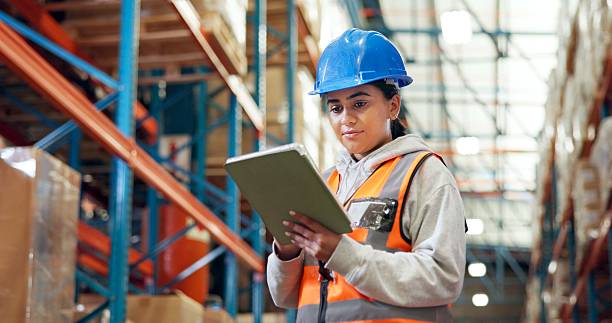 istock Logistics, browsing and woman with tablet in warehouse, distribution and info for quality assurance. Factory, distributor and person with tech for stock inventory, online or goods for supply chain 2246657487