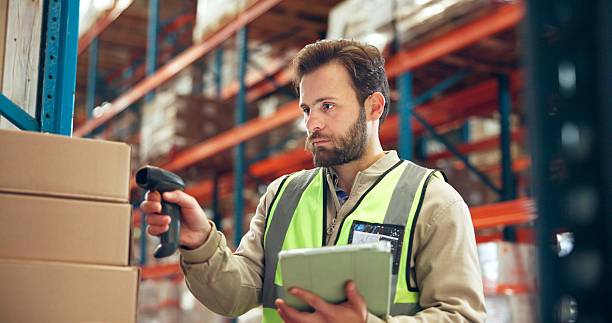 istock Logistics, tablet or man with box scanner in warehouse for inventory, package accuracy or shipping. Supply chain, picker or distribution database for stock management, storage system or parcel update 2246657511
