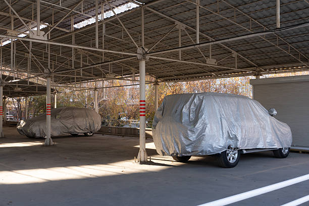 istock Covered Cars in Parking Garage 2246664587