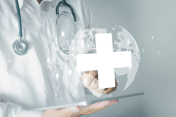 istock Doctor holding Tablet with Global Medical Icon 2246672933