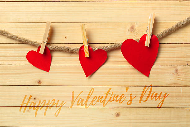 istock Hanging red hearts on twine with a message for a special Valentine's celebration 2246679896