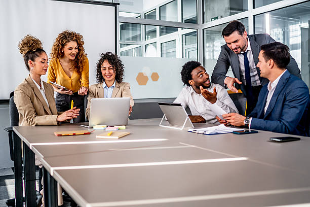 istock Diverse business team collaborating and discussing in modern office 2246682301