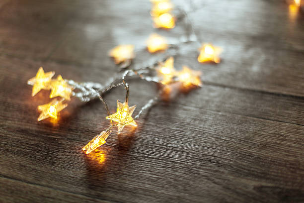 istock Twinkling star lights create a cozy atmosphere in a warm indoor setting 2246682559