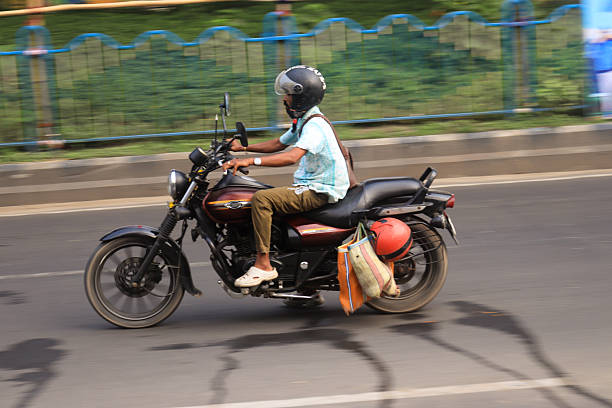 the motorcycle has a leather trunk in the form of a ski for luggage transportation. leather motorcycle bag with clasps, close-up