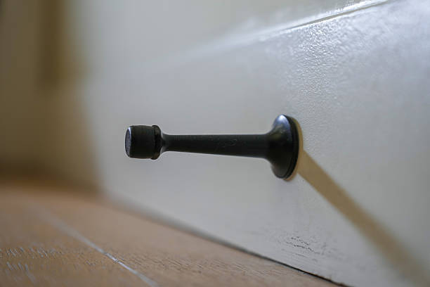 istock Black door stop in close up detail 2246693786