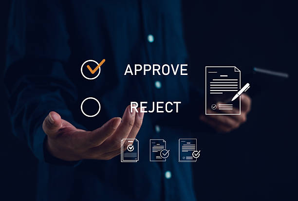 istock Businessman choosing approve or reject on digital document interface, concept of online approval process, electronic signature, business decision, workflow management, and corporate validation. 2246695750