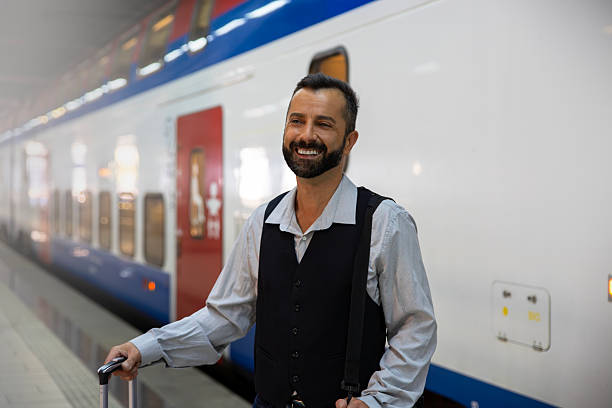 Handsome businessman arrived at the subway station by train