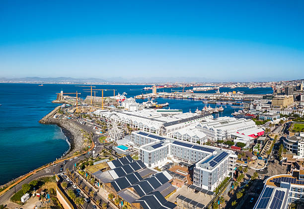 Cape Town V & A Waterfront, and the Harbour towards the Atlantic Ocean, with the Ferris Wheel (Cape Wheel), Shopping Mall, hotels and restaurants.