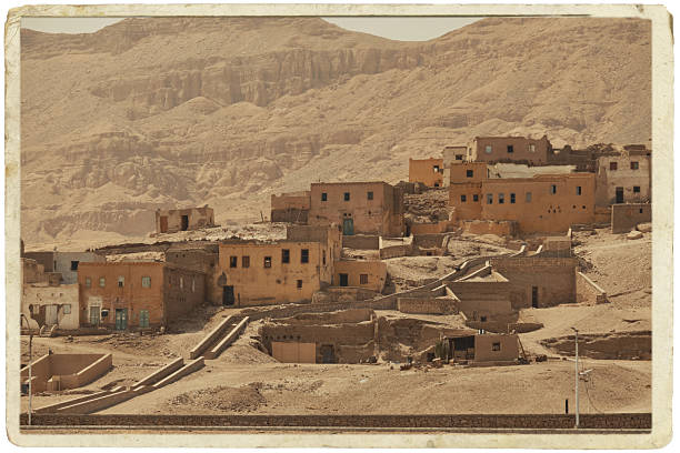 Abandoned tomb robbers' village in Luxor. Village ​​of craftsmen in Upper Egypt, Luxor, City of the Dead. Toned Image in a old paper frame