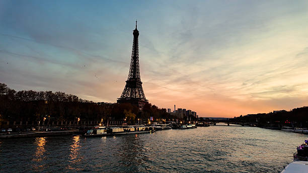 istock Cinematic Sunset Silhouette of Eiffel Tower Over Seine River 2246702049