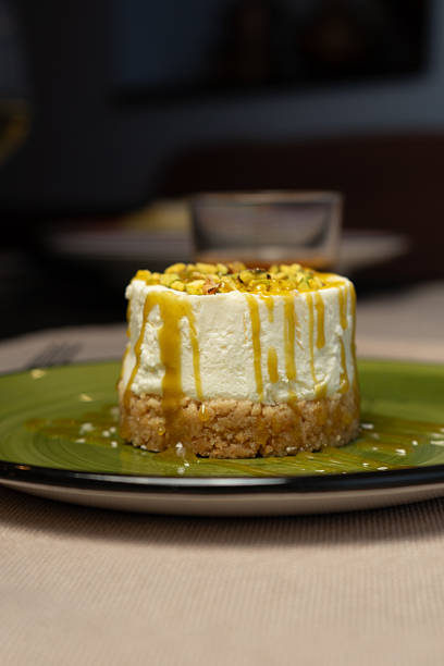 Sweet ricotta and pistachio tart on a plate at the restaurant