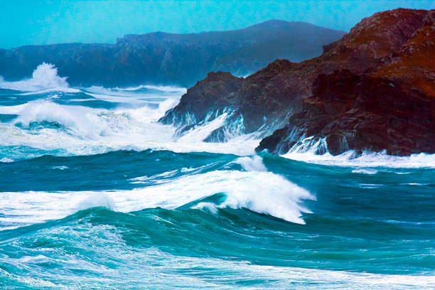 High angle view of breaking waves and rocky coastline, seascape ,  A Coruña province, Galicia, Spain. Camino de Santiago, camiño dos faros.