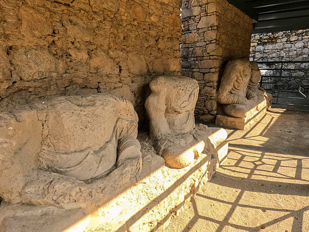 istock Heritage Three headless stone Buddhist statues in Gandhara monastery ruins Mohra Muradu Taxila Pakistan 2246704351