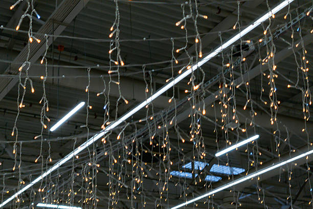 istock Decorative string lights hang from the ceiling in a spacious indoor venue creating a festive atmosphere during an evening event 2246706580