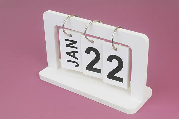istock January, 22 on calendar on purple background. 2246708116