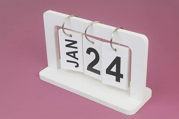istock January, 24 on calendar on purple background. 2246708130