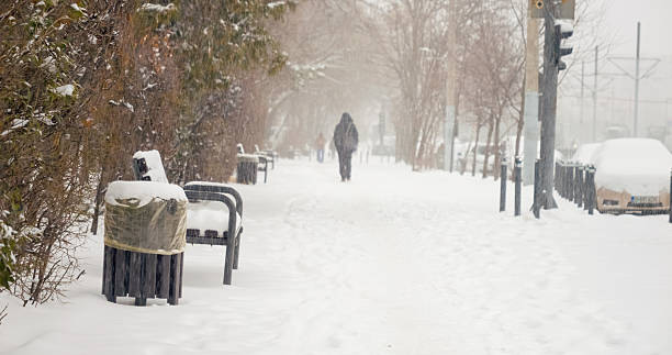 istock Snow blankets the city streets creating challenging winter conditions 2246711595