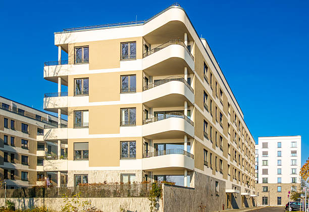 istock modern multi-story apartment building with balconies 2246712439
