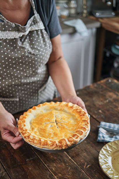 istock Preparing Thanksgiving Leftover Pie with Turkey, Vegetables and Boiled Eggs 2246713243