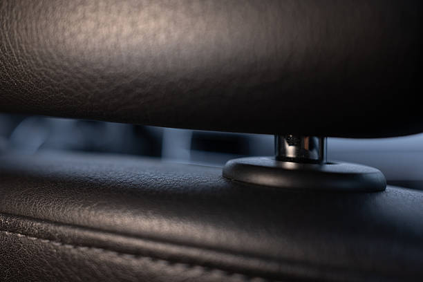 istock Premium black leather car seat headrest detail 2246714935