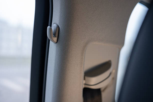 istock Convenient clothes hanger hook in a car. 2246715052