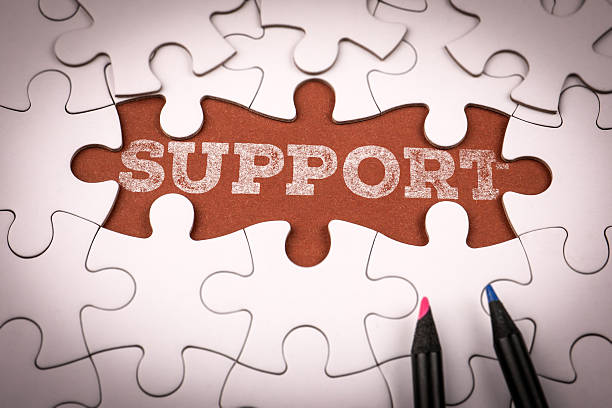 istock Support Concept with Puzzle Pieces and Colored Pencils 2246722157