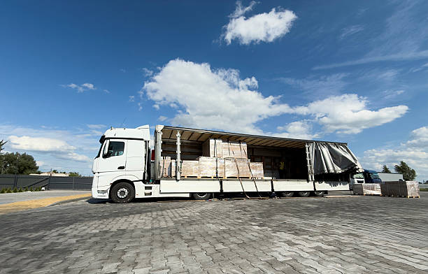istock Open truck trailer loaded with cargo pallets 2246723213