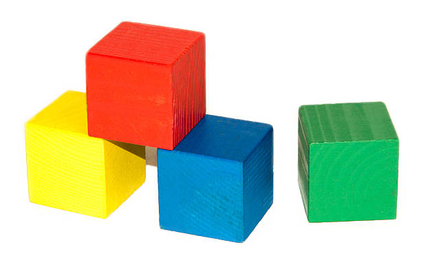 istock Coloured wooden cubes on white background 2246727236