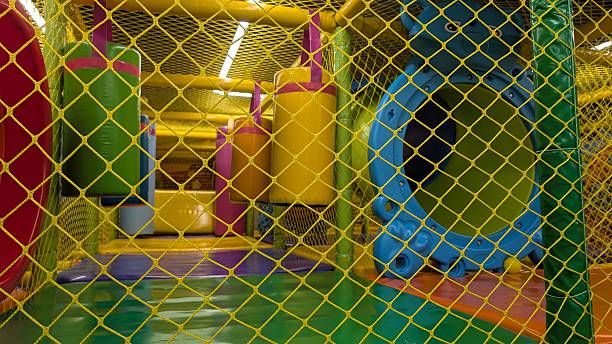 istock Engaging obstacle course with cushioned surfaces and colorful pillars 2246742194