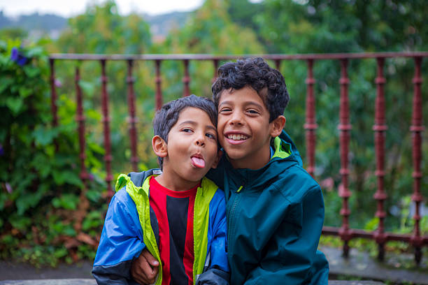 Loving brothers together playing in the living room - Buenos Aires - Argentina