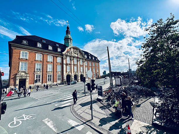 copenhagen, denmark - July 24 2023: The luxury hotel Villa Copenhagen stands proudly in an elegant building on a sunny day with pedestrians and bicycles surrounding the area.