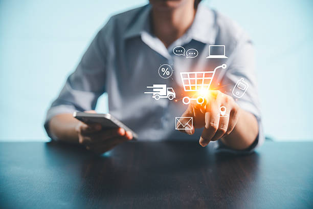 istock Concept of procurement technology shopper using computer or laptop for online shopping, e-commerce convenience with credit card payments, digital trolleys, fast delivery powered by modern technology. 2246778415