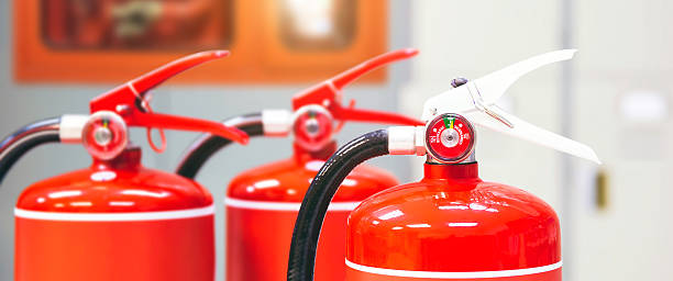 istock Fire extinguisher, Close-up red fire extinguishers tank in the building for fire equipment for extinguishing or protection and prevent for emergency and safety rescue and alarm system training. 2246778434