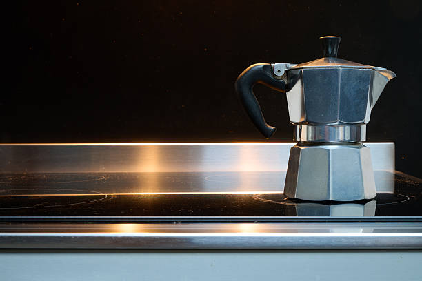 Italian moka coffee maker on Stove from front