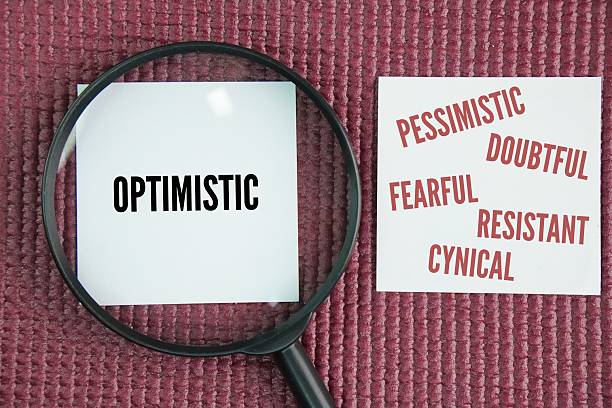 istock Magnifying glass and paper with the words Positive mindset optimistic and Negative mindset are pessimistic, doubtful, fearful, resistant, cynical 2246781194